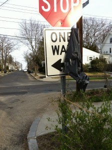One Way sign covered with a bag